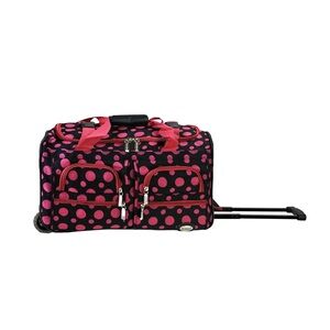 Rockland 22-inch rolling duffel bag in a black and pink dot pattern